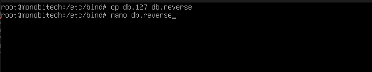 Mengedit file db.reverse untuk konfigurasi reverse DNS di Debian